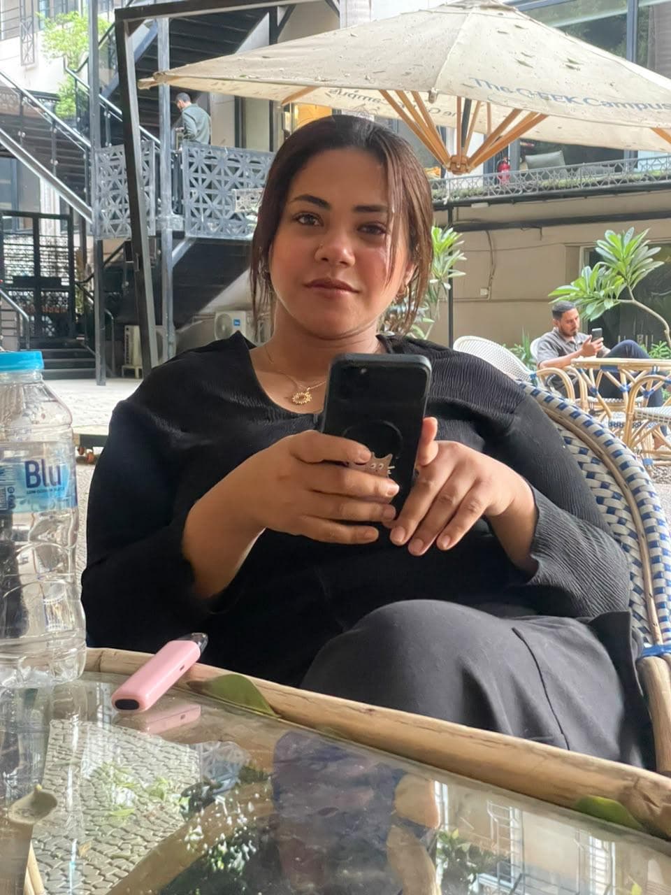 Shams at an outdoor café
